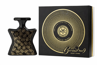 Black and gold perfume bottle and packaging with 'Bond No. 9' branding on a white background