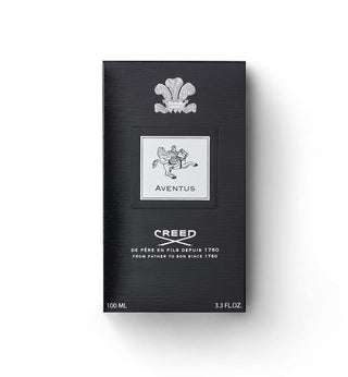 Creed Aventus 100ml box packaging, featuring a textured black background with a silver crest and logo details, set against a plain white background.