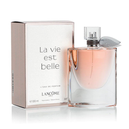Lancôme La Vie Est Belle Eau de Parfum bottle with its original packaging box, displayed on a reflective white surface against a white background.