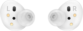 A pair of white wireless earbuds with transparent silicone tips, featuring gold and black sensor accents and L/R markings on a plain white background.