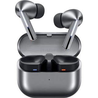 True wireless earbuds in a metallic dark gray charging case, shown open with both earbuds positioned above the compartment. The earbuds have black tips and a brushed silver finish, with small blue and orange indicator lights visible inside the case.