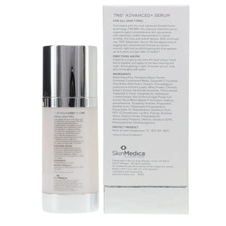 Skincare serum bottle with its packaging on a white background